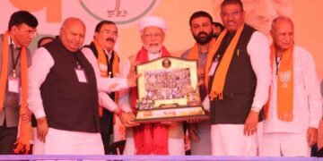 Upcoming Dhaman Gujarati movie's producer Bhupat Bodar presents memento to PM Modi behalf of his Dhaman team 